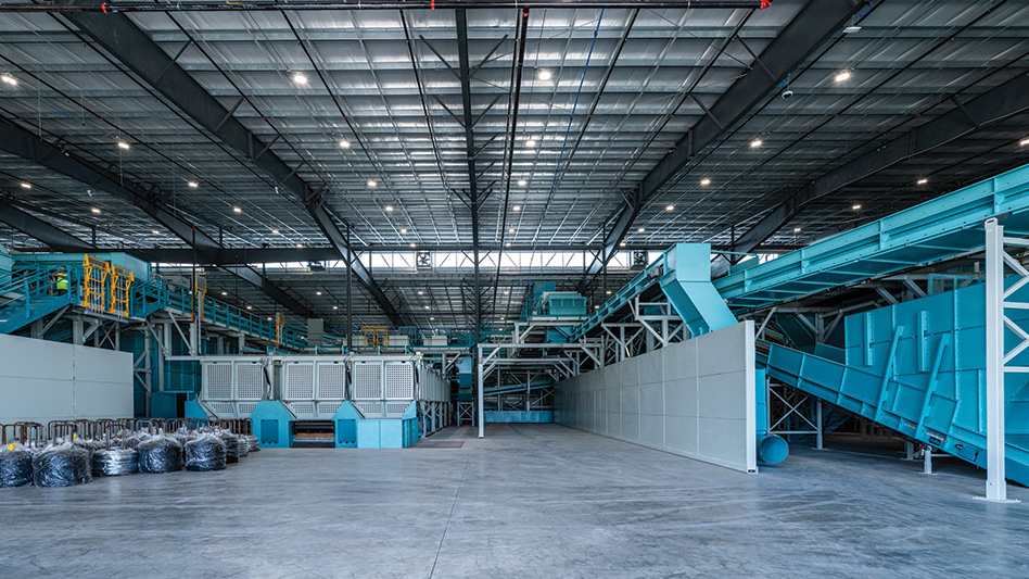 A view of automated bunkers for recycling materials in a MRF.