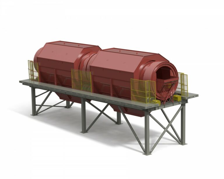 Image of industrial rotary kilns. The Trommel equipment has two large, cylindrical drums with a reddish hue mounted on a support structure. Safety railings in yellow enclose parts of the structure. The rotary kilns are used for high-temperature processing of materials.