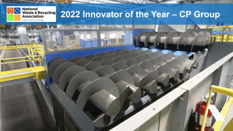 A large industrial machine with multiple spiral components is shown inside a facility. The banner above reads "2022 Innovator of the Year – CP Group." The National Waste & Recycling Association logo is displayed in the top left corner.