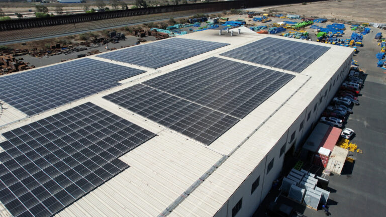 Image overview of a manufacturing building with a solar roof